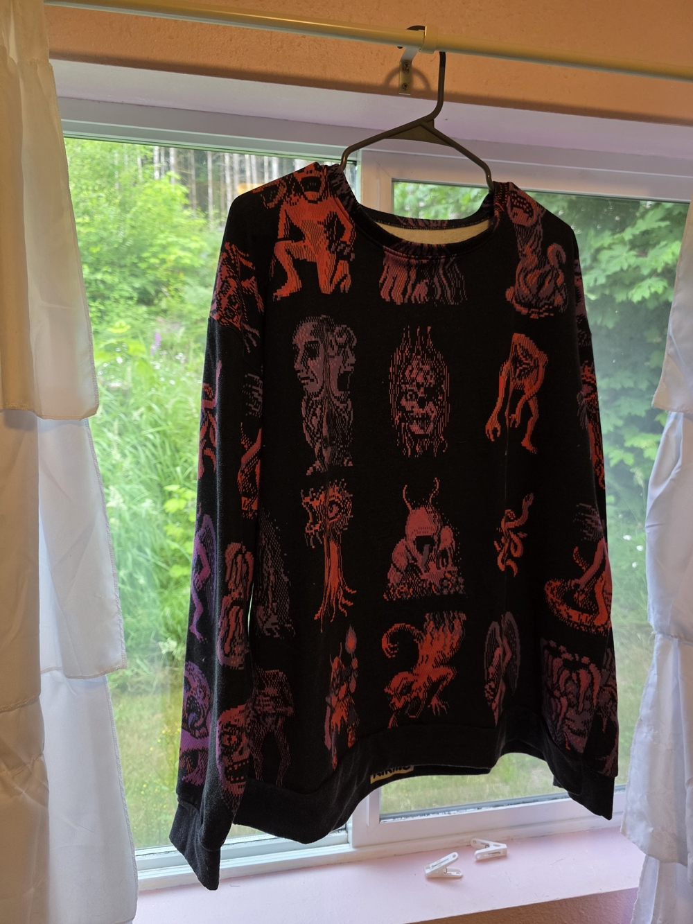 Kikillo Black Sweater with Red and Purple Graphic Monster Print